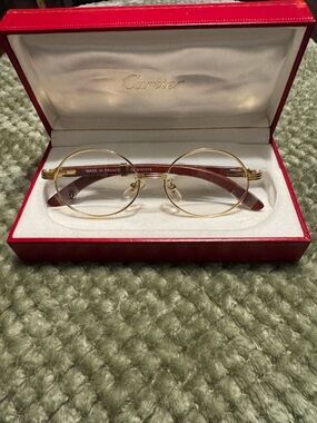 Cartier Gold Round Eyeglasses with Brown Temples